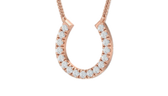 Rose gold horseshoe necklace with diamonds on a white background