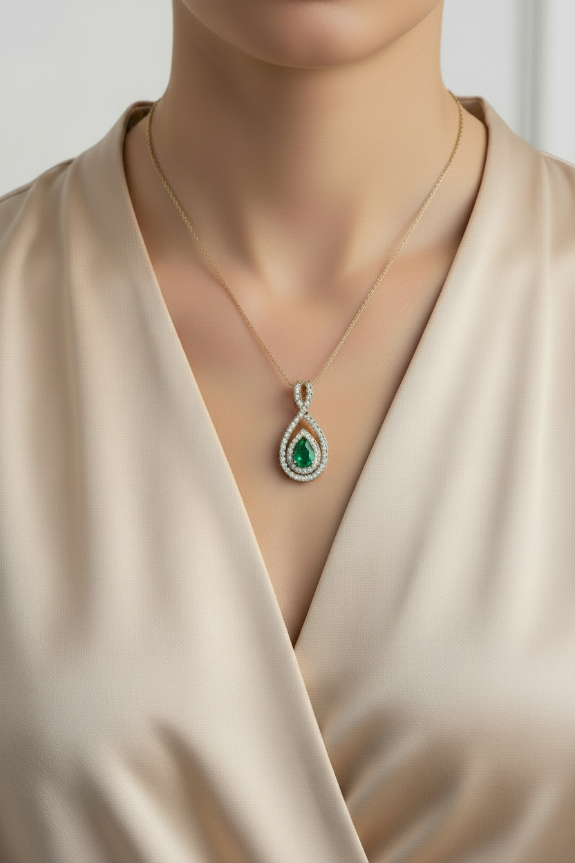 Emerald Pear-Cut Infinity