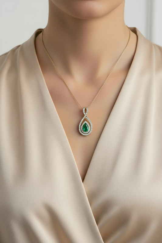 Emerald Pear-Cut Infinity